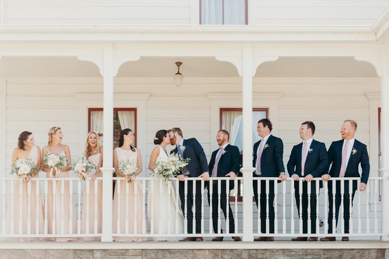 Farmhouse wedding party portrait