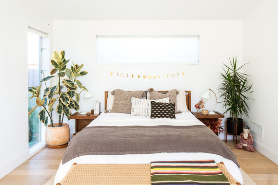 Cozy master bedroom for fall with Coyuchi on 100 Layer Cake