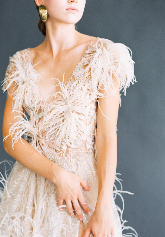 white feather wedding dress