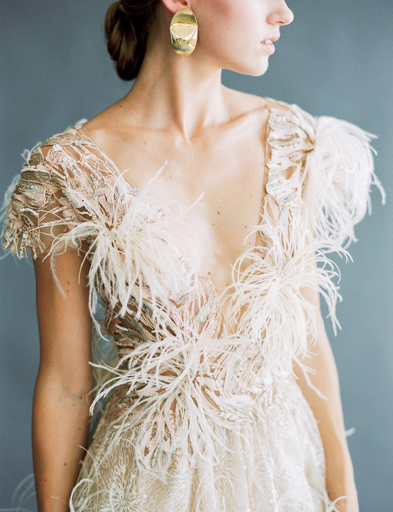 white feather wedding dress