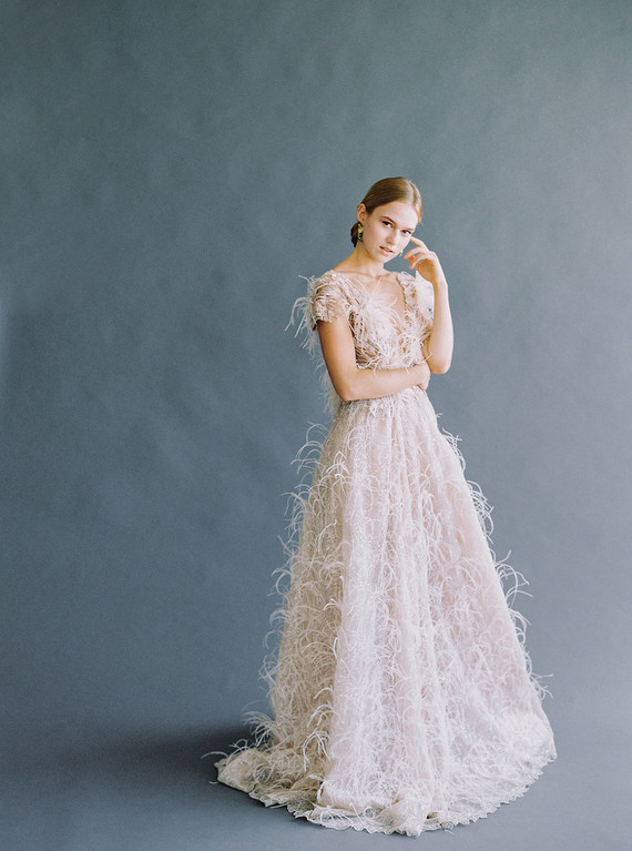 white feather wedding dress