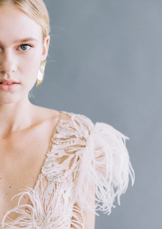 white feather wedding dress