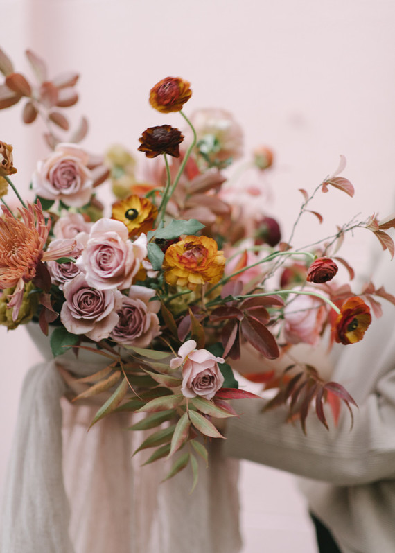 Muted jewel tone floral arrangement