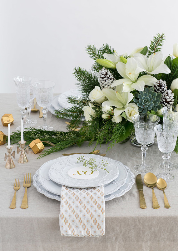 Elegant holiday place setting with Teleflora on 100 Layer Cake