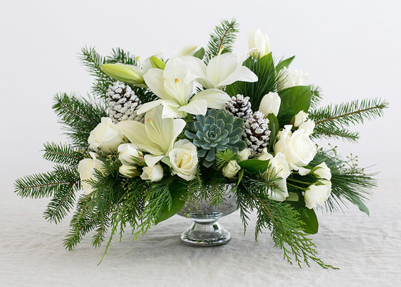 Elegant holiday place setting with Teleflora on 100 Layer Cake