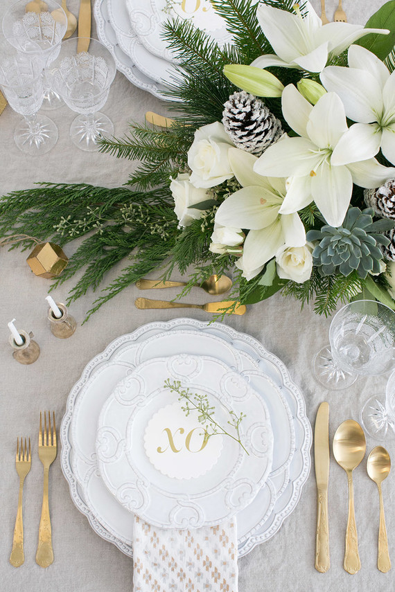Elegant holiday place setting with Teleflora on 100 Layer Cake