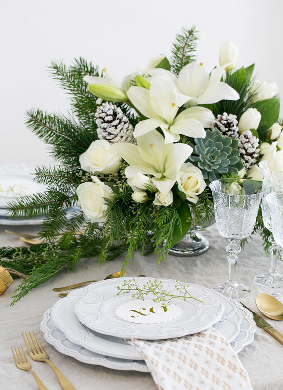 Elegant holiday place setting with Teleflora on 100 Layer Cake