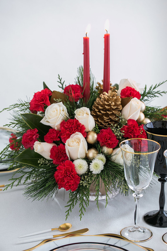 Fancy holiday place setting with Teleflora on 100 Layer Cake