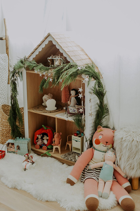 Doll house decorated for Christmas