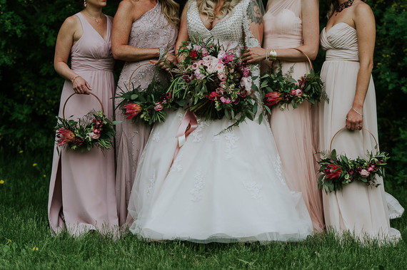 blush bridesmaid dresses and pink bouquets