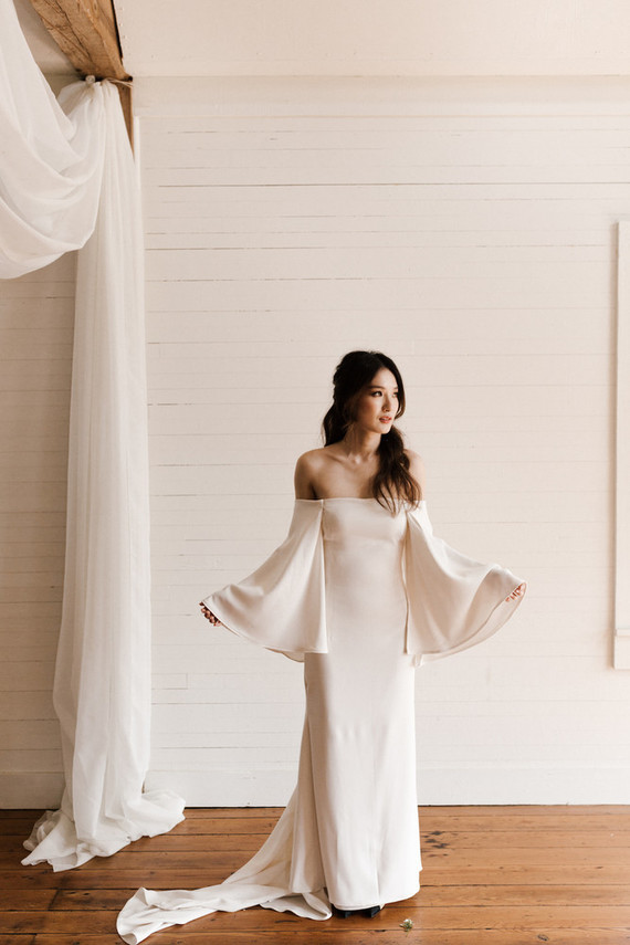 Bell sleeved bridal gown