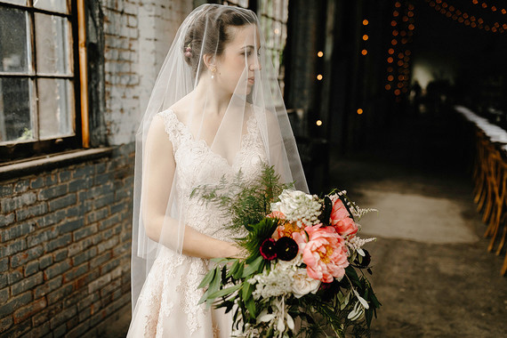 Romantic, industrial, floral wedding at Basilica Hudson in the Hudson Valley