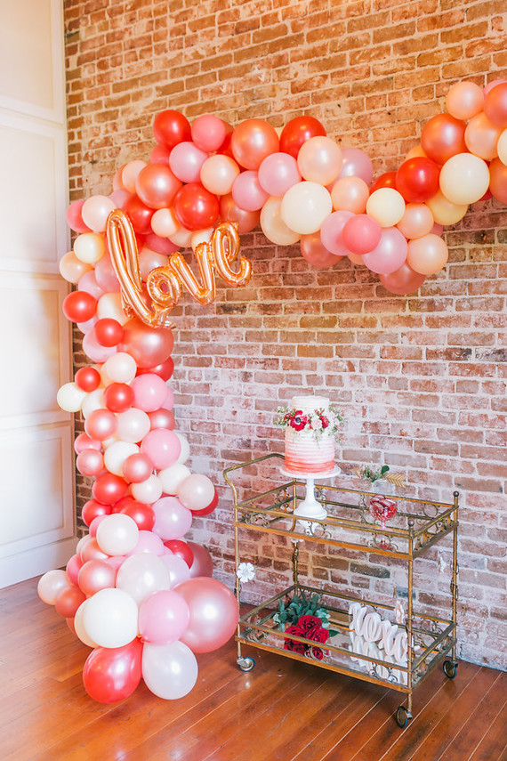 balloon arch and bar cart