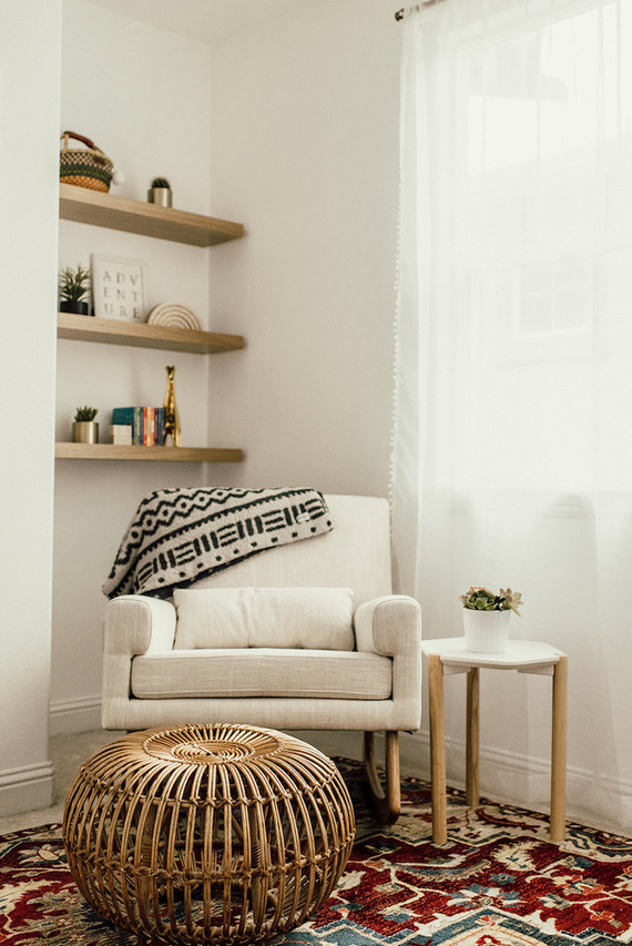 Gender neutral gold and emerald boho nursery