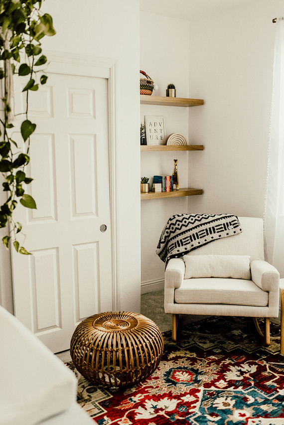 Gender neutral gold and emerald boho nursery