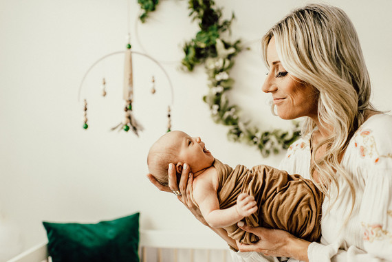 Gender neutral gold and emerald boho nursery