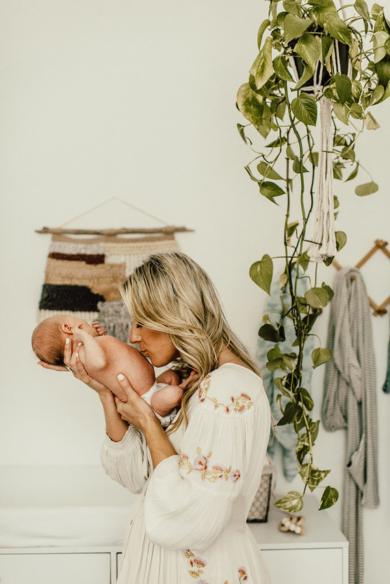 Gender neutral gold and emerald boho nursery