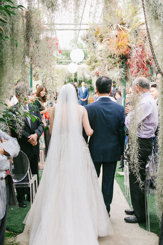 Whimsical greenhouse wedding at Shelldance Orchid Gardens