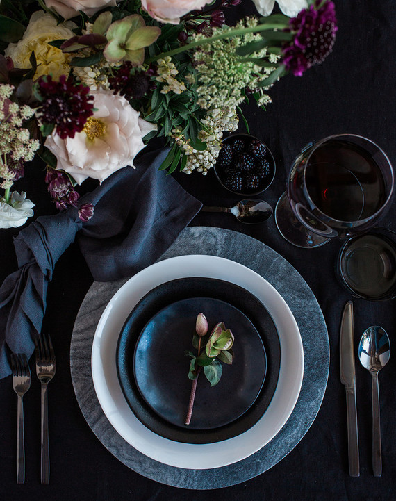 Dark and moody floral place setting with Crate and Barrel