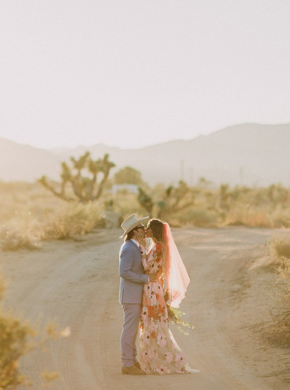 Rustic Joshua Tree wedding with a pink floral dress