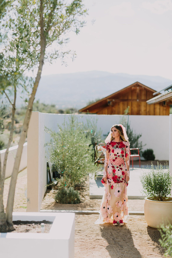 Rustic Joshua Tree wedding with a pink floral dress