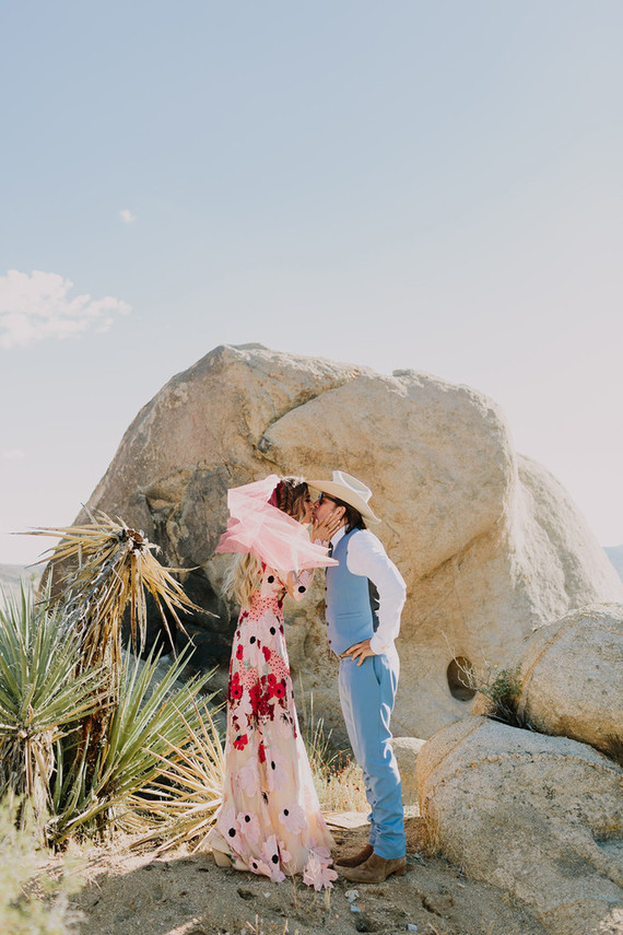 Rustic Joshua Tree wedding with a pink floral dress