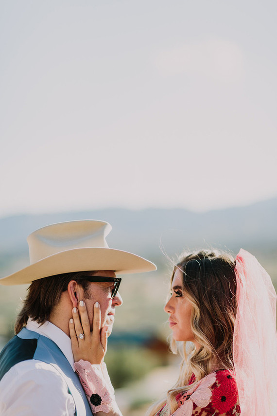 Rustic Joshua Tree wedding with a pink floral dress