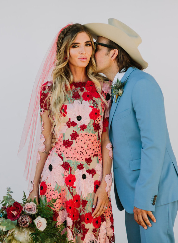 Rustic Joshua Tree wedding with a pink floral dress