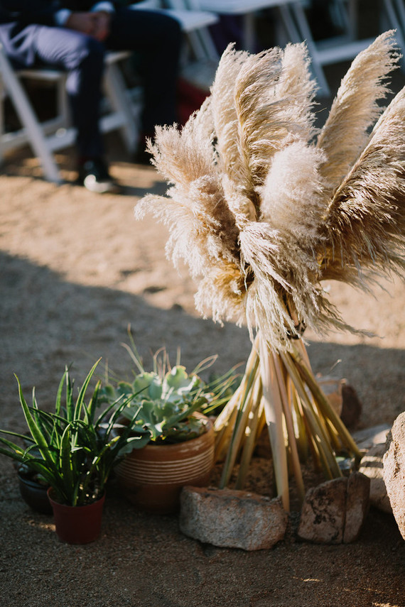 Rustic Joshua Tree wedding with a pink floral dress