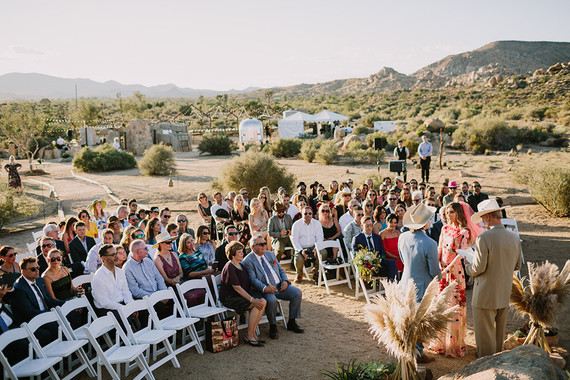 Rustic Joshua Tree wedding with a pink floral dress