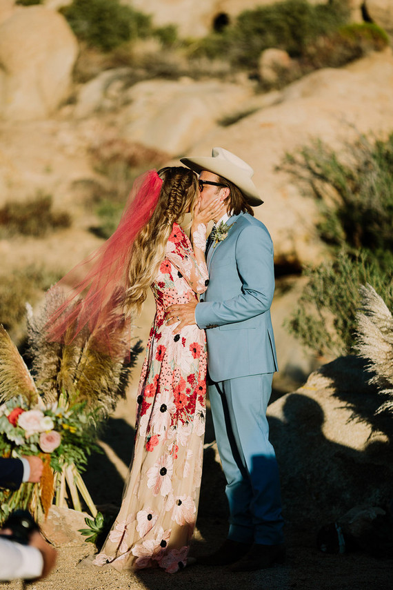 Rustic Joshua Tree wedding with a pink floral dress