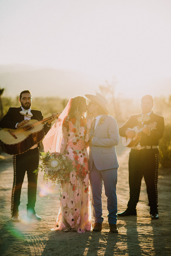 Rustic Joshua Tree wedding with a pink floral dress