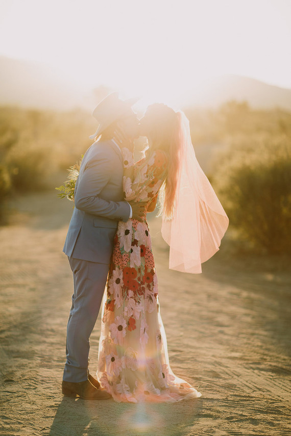Rustic Joshua Tree wedding with a pink floral dress
