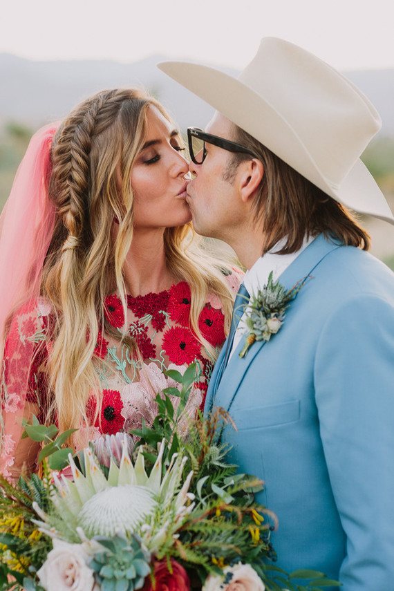 Rustic Joshua Tree wedding with a pink floral dress