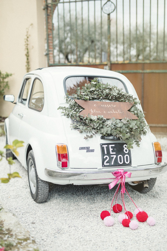 Vintage fiat wedding getaway car