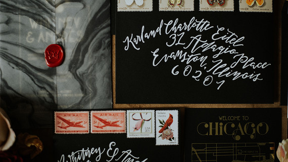 black wedding envelopes with calligraphy