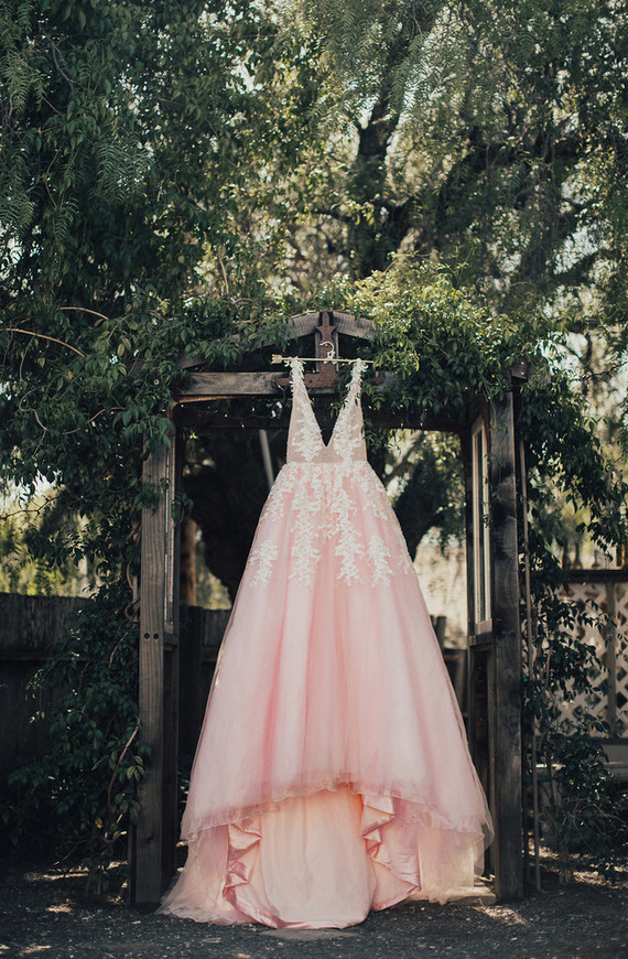 Rustic California wedding with a pink dress