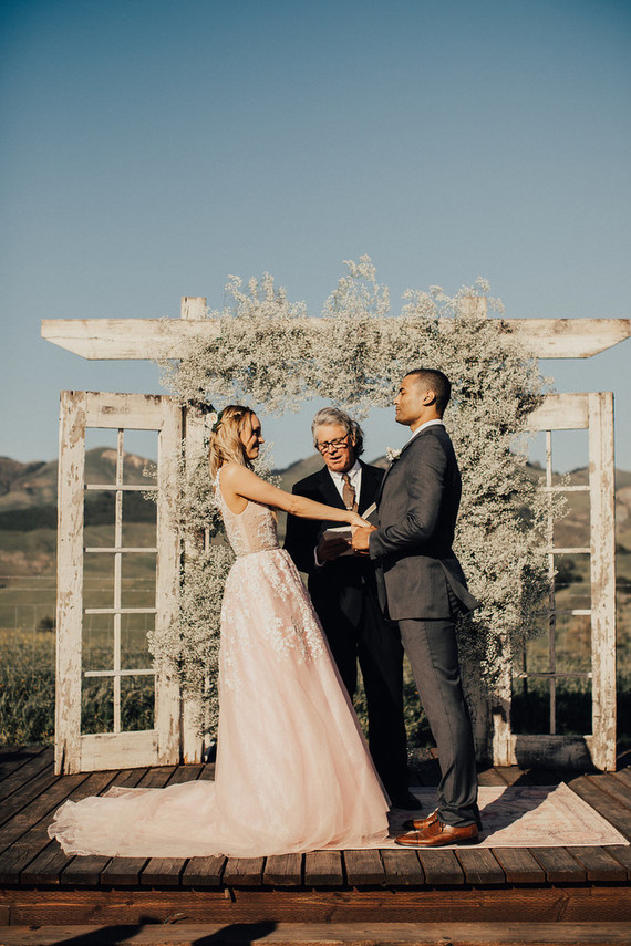 Rustic California wedding with a pink dress