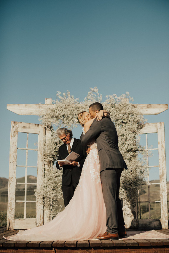 Rustic California wedding with a pink dress