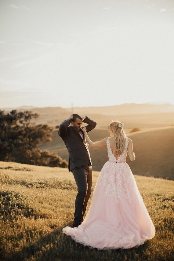 Rustic California wedding with a pink dress
