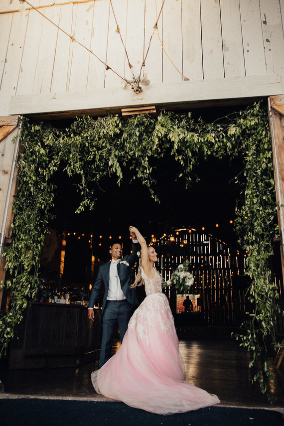 Rustic California wedding with a pink dress
