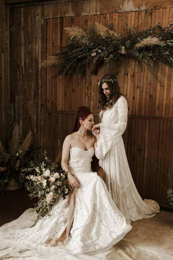 Romantic urban same sex wedding ideas with blush tones