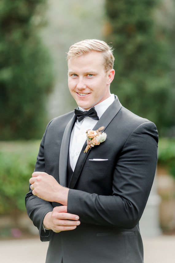 Colorful modern wedding with a killer tropical floral installation