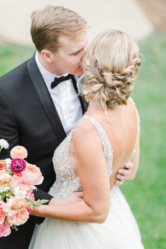 Colorful modern wedding with a killer tropical floral installation