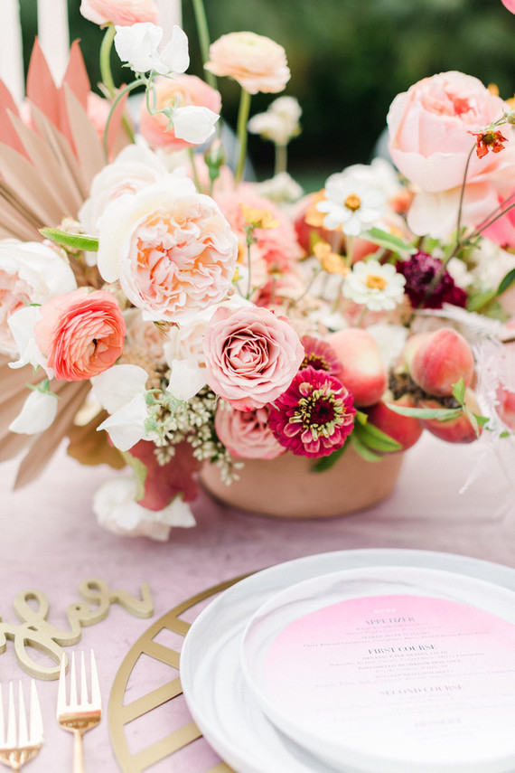 Colorful modern wedding with a killer tropical floral installation