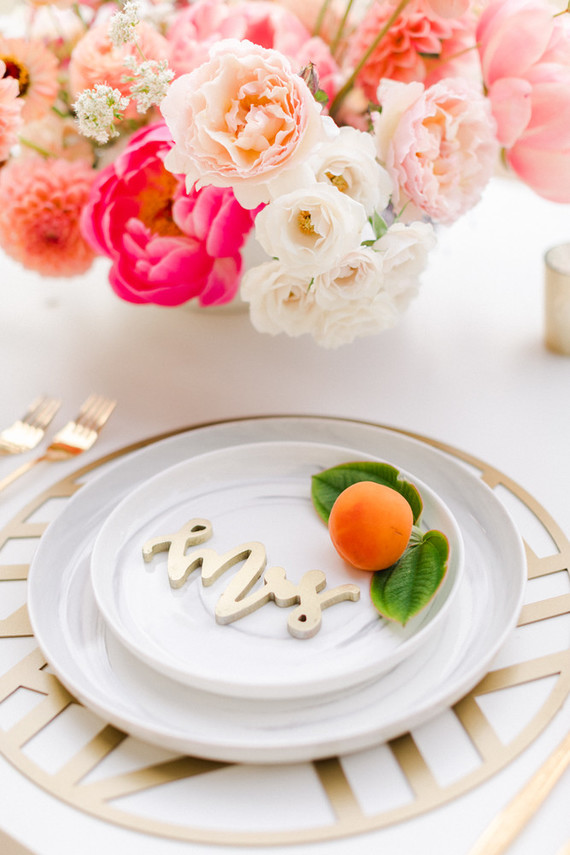 Colorful modern wedding with a killer tropical floral installation