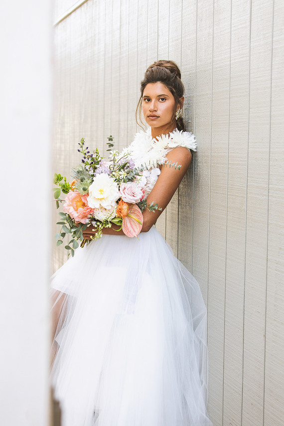 Surf inspired beach wedding in Montauk with the world's cutest dress