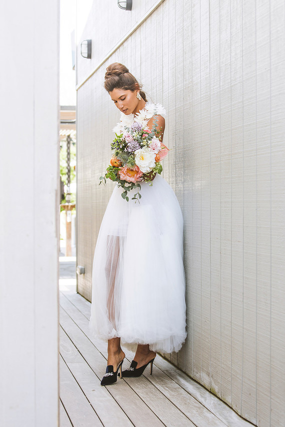 Surf inspired beach wedding in Montauk with the world's cutest dress