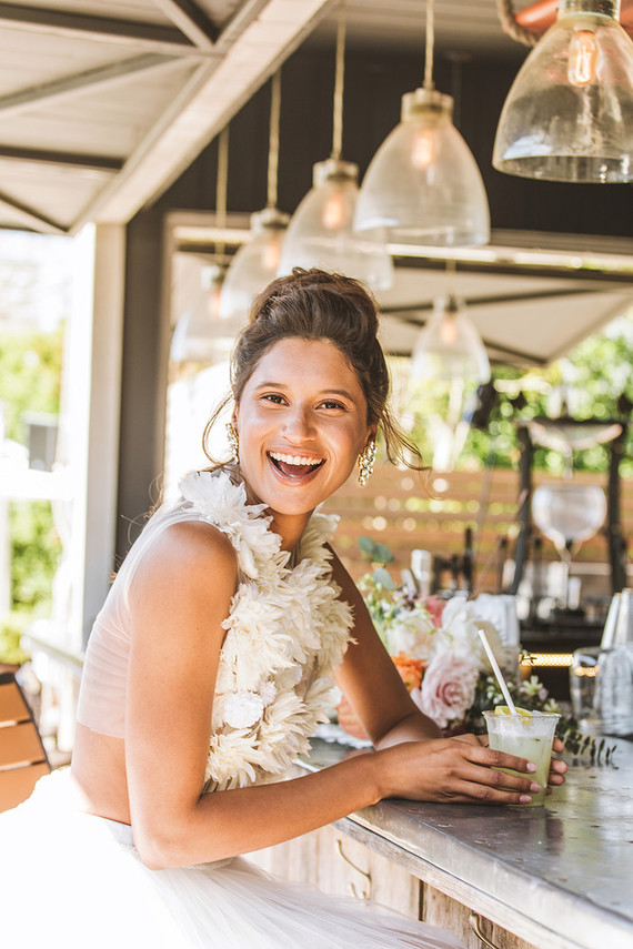 Surf inspired beach wedding in Montauk with the world's cutest dress