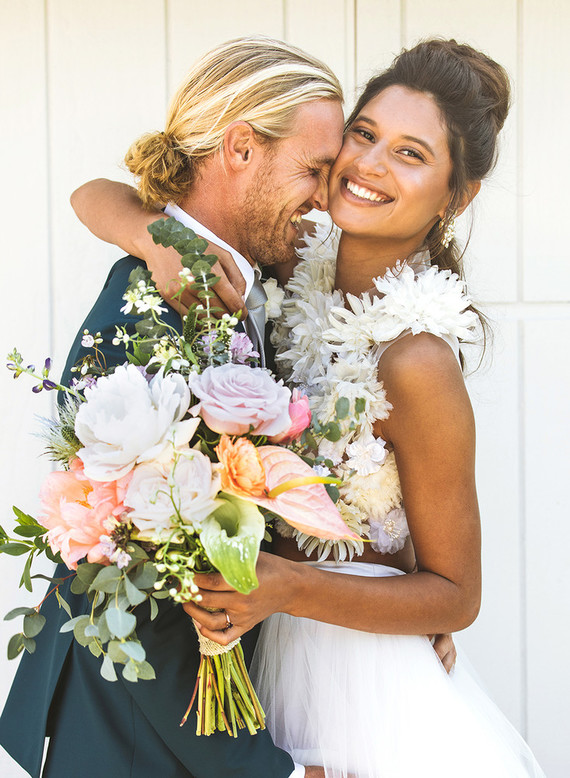 Surf inspired beach wedding in Montauk with the world's cutest dress